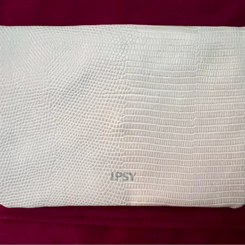 IPSY Envelope Accessory Bag Embossed Cream and Green with Snap Closure.
